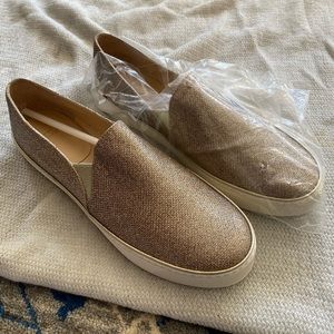NWOT Stuart Weitzman metallic slip on sneakers.